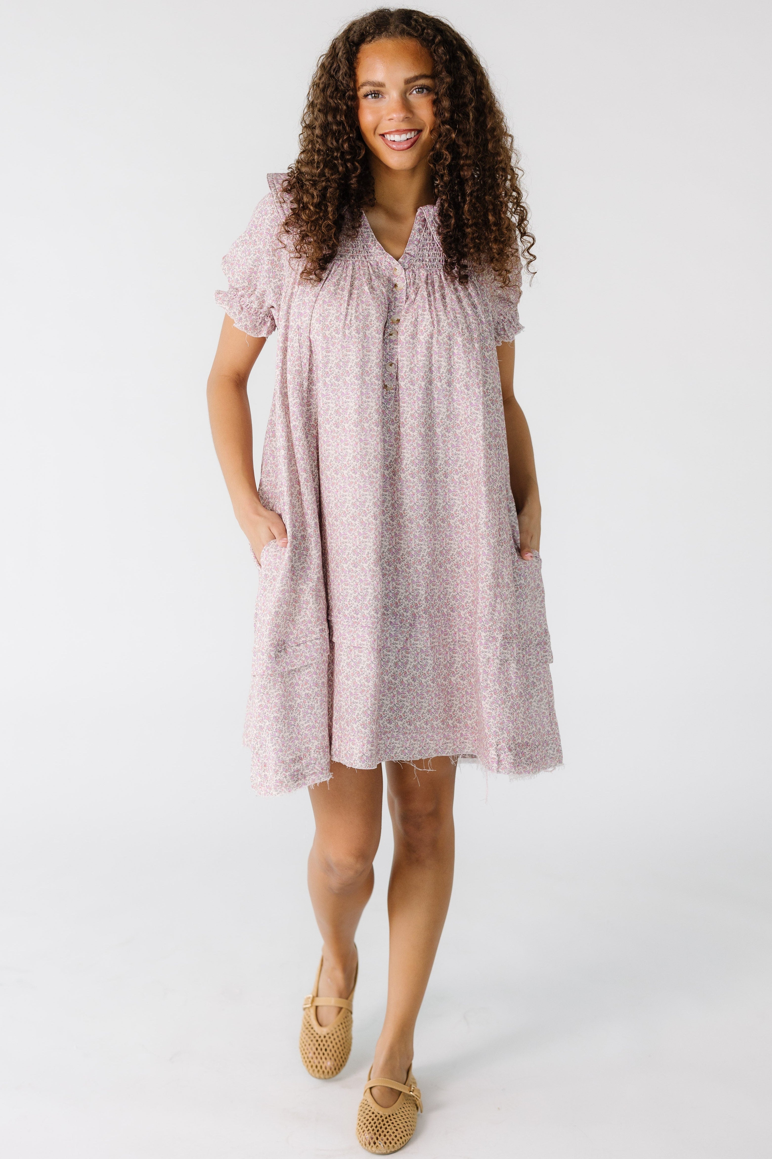Teen_girl_wearing_a_pink_and_white_floral_print_dress_in_knee_length_and_side_pockets.jpg Brass & Roe Ditsy Collared Knee Dress