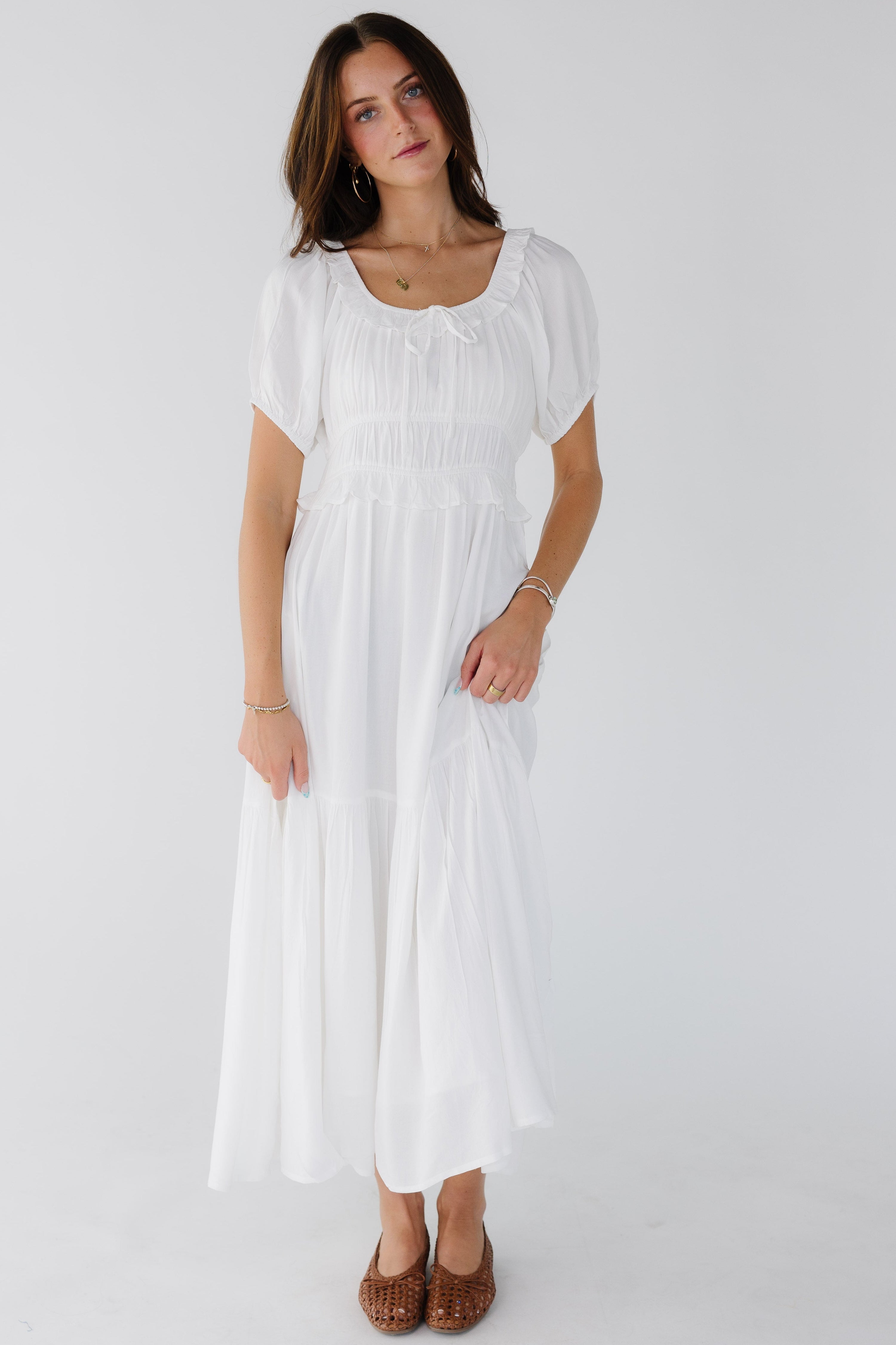 Woman_wearing_a_white_midi-maxi_with_a_full_skirt_wide_waistband_and_a_close_fitting_bodice.jpg Citrus Jena Dress