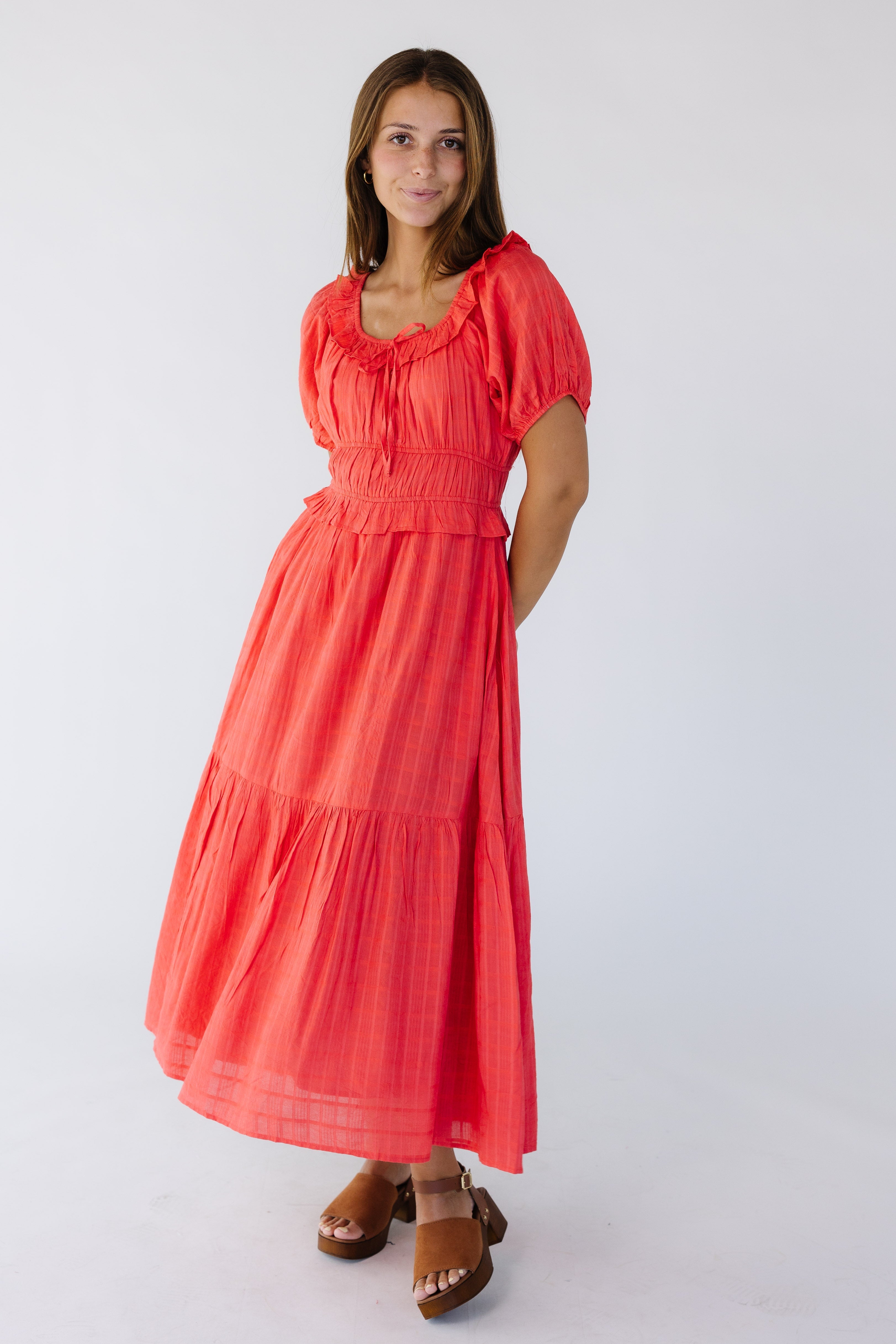 Youngwomanwearingamodestredmididresswithrufflesandawideclosefittingwaistband.jpg Citrus Jena Dress - Red